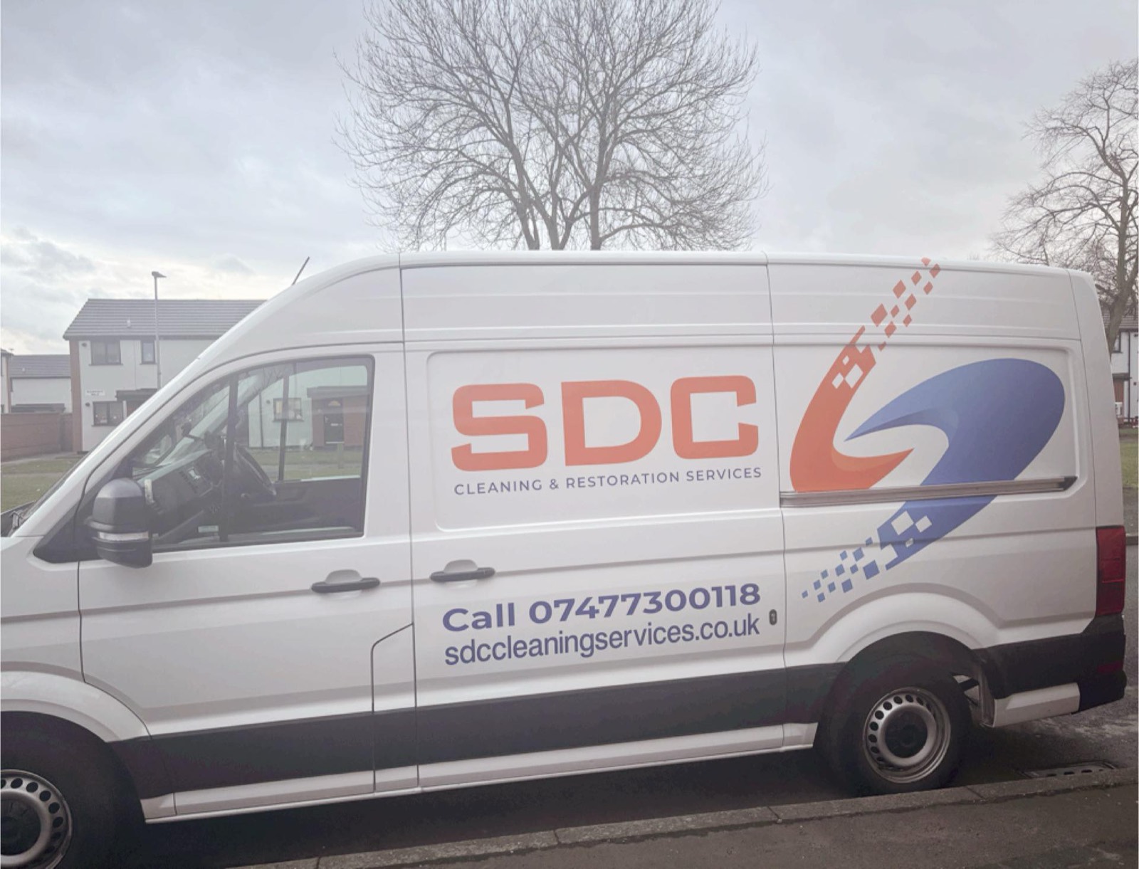 SDC Cleaning & Restoration Services sign-written van